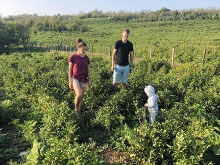 Hanna with her family in Renegade Tea Estate